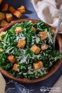 Kale Caesar salad in a bowl.